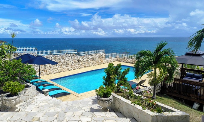 Pelican Key Villa | Villa privada de lujo Pelican Key con vista panorámica del mar Caribe