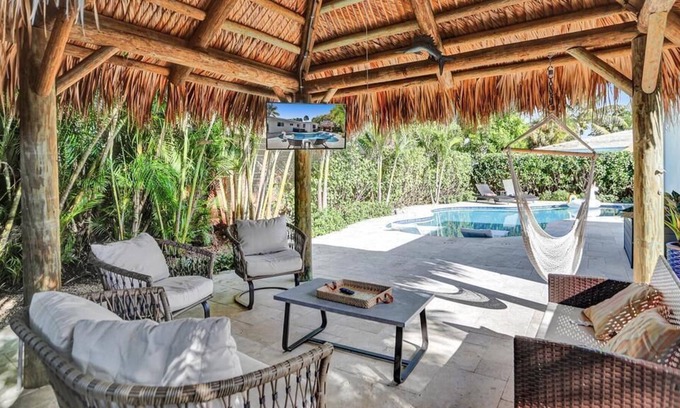 Deerfield Beach Villa | 4 BR Beach Home Heated Pool Jacuzzi + Tiki TV Hut Dog Friendly