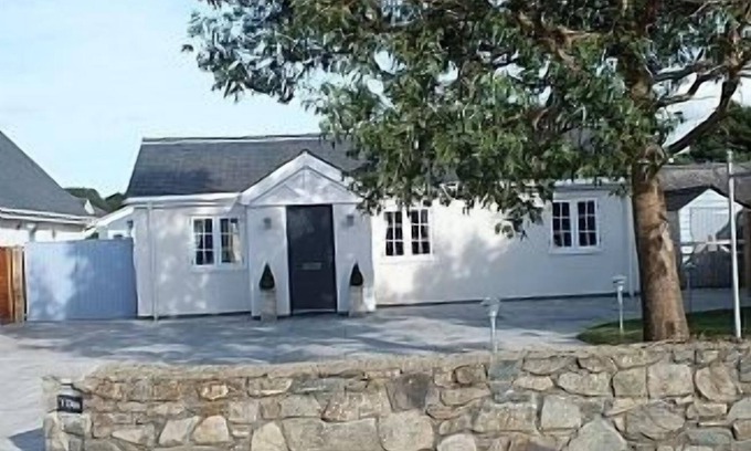 Morfa Bychan Cabaña | 4 estrellas, casa de vacaciones de lujo de tres camas con bañera de hidromasaje y estufa de leña