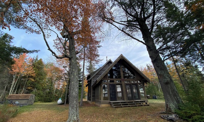 Eagle River Cabina | 40 Acre Wooded Retreat on Columbus Lake with 1300 feet of shoreline.