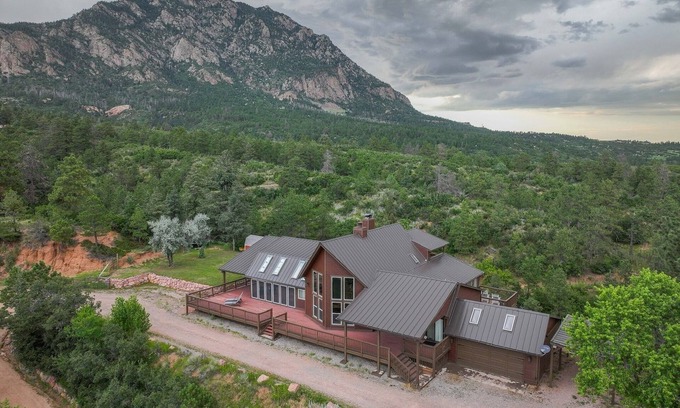Colorado Springs Casa | 4BR 4BA multi-family with multiple outdoor & indoor living spaces, hot tub, BBQ.
