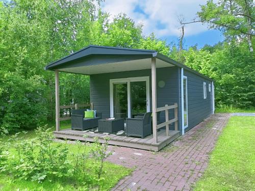 Oosterwolde Chalet De Esquí | 4p chalet TOLVE met 4 fietsen vlakbij natuurgebieden Drents Friese Wold, Fochteloërveen en gevangenisdorp Veenhuizen
