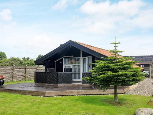 Hasmark Strand Casa | 5 person holiday home in Otterup