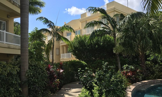 Cotton Ground Condominio | 50 yardas de la playa, estas actualizaciones te hacen sentir como en casa