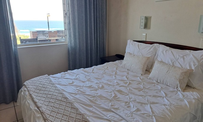 Illovo Beach Apartamento | #7 Illovo ViewsCharming 2-bedroom apartment with WiFi in Kingsburgh
