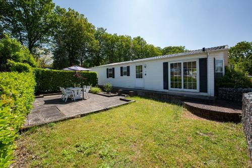 Oisterwijk Chalet De Esquí | 79, Ruime chalet aan de Kampina