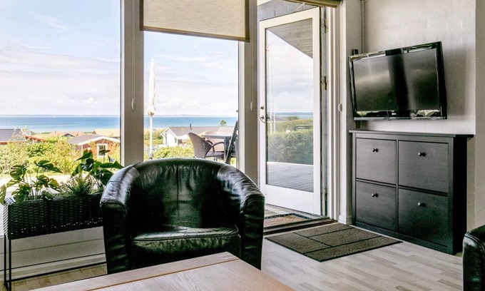 Skastrup Strand Casa | Moderna casa de vacaciones en Bogense con piscina cubierta