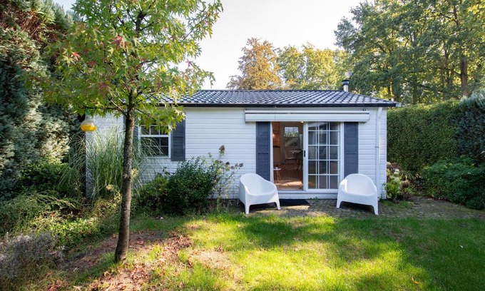 Oisterwijk Chalet De Esquí | 84, gelegen in het rustige & bosrijke Oisterwijk! Met privétuin