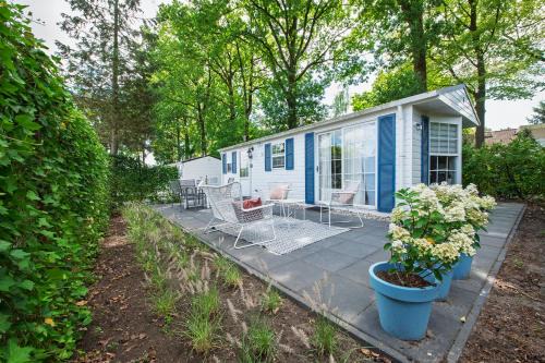 Oisterwijk Chalet De Esquí | 87, gelegen in het rustige & bosrijke Oisterwijk!