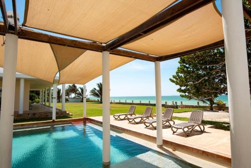 Chicxulub Puerto Casa | 97985 Stunning beachfront Suites Wi-Fi East of Progreso