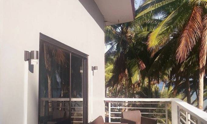 Abra de Ilog Casa | A 3 floor contemporary styled beach house. Steps away from fine white sands!
