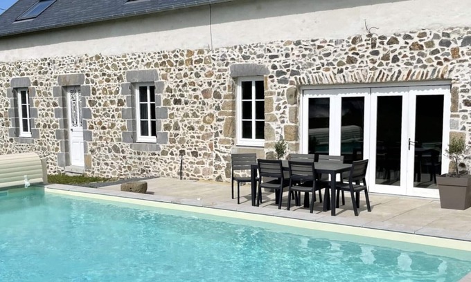 Gouville-sur-Mer Otro | A wonderfully reimagined cottage with pool, hot tub and garden close to the sea.