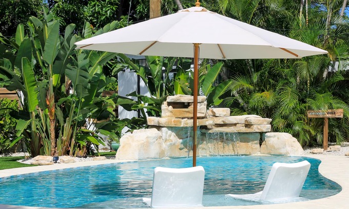 Poiciana Park II Casa | A beautifully renovated private home with a large backyard, Pool, and Hot Tub