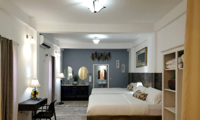 Corinthe Apartamento | A Chic Elegant Apartment with two cozy King size beds.