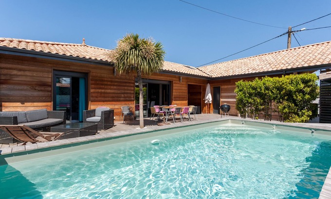 Carcans Plage Villa | Casa con piscina privada climatizada de grilletes playa, 50 m pla