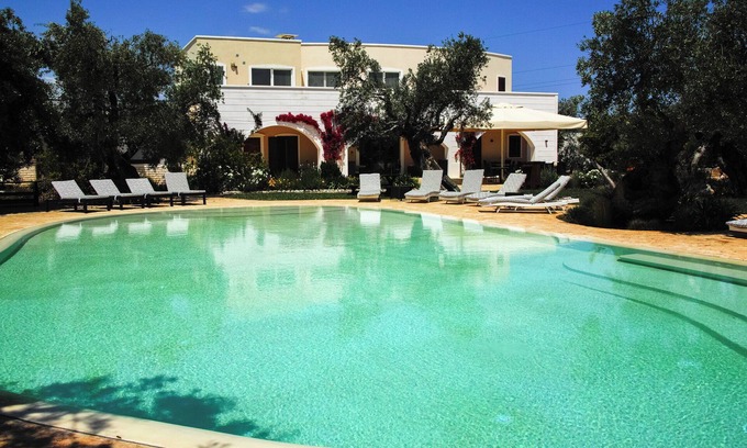 Carovigno Otro | A lovely place emerged in the garden and surrounded by the olive trees