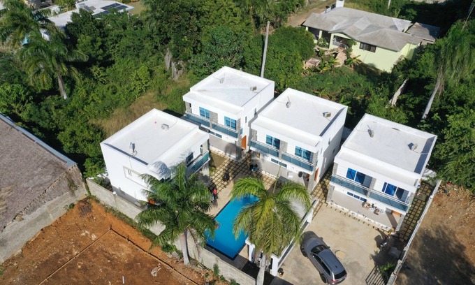 Urbanizacion Tavarez Villa | A modern 2-bedroom villa with pool and lounge area
