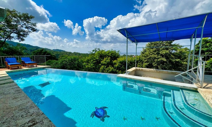 Lawson Rock Apartamento | A Modernist Paradise Overlooking the Caribbean Sea.