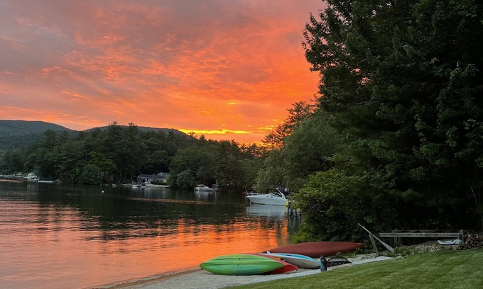 Alton Bay Casa | A quiet cove, the sunset and a sandy beach, on Lake Winnipesaukee
