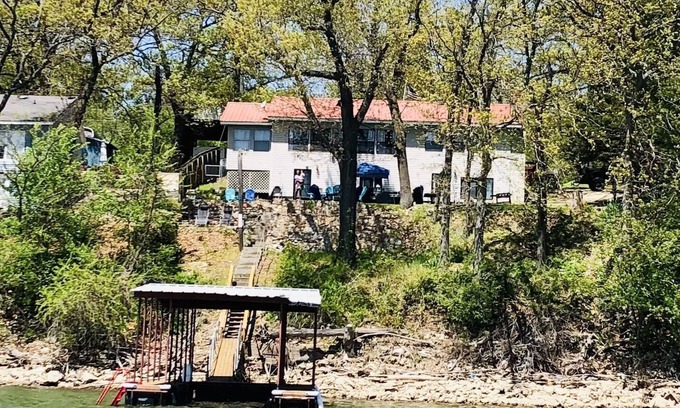 Grove Casa | A serene waterfront view with private dock. Spend quality family time and relax.