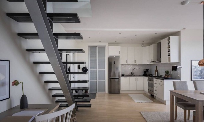 Centrum Apartamento | A top floor duplex with city views and chimney