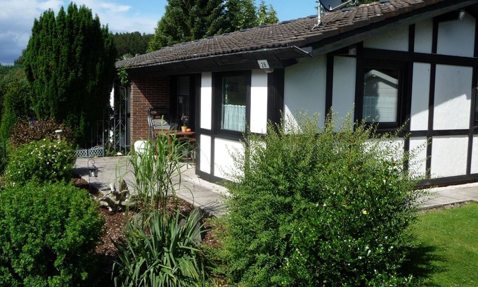 Feriendorf Hennesee Casa | Alojamiento Ferienhaus am Hennesee Senderismo con perro, pesca en el lago Hennesee vista