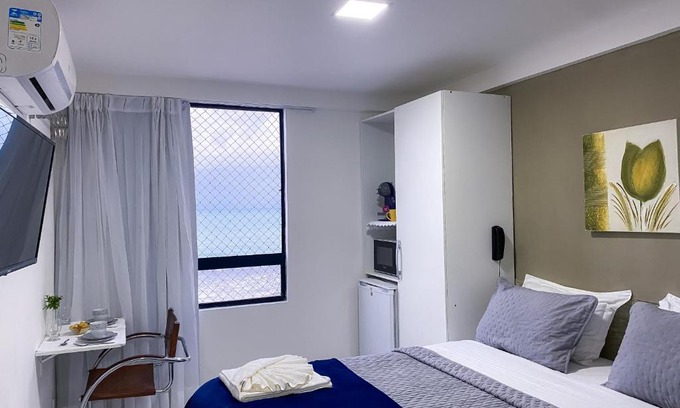 Areia Preta Apartamento | Acomodação aconchegante à beira- mar