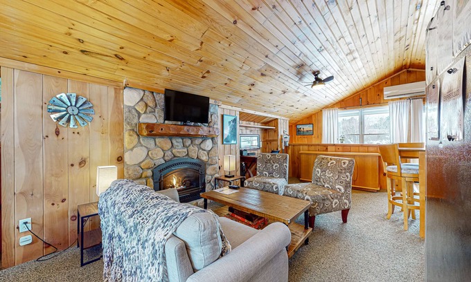Gilford Cabaña | Adorable cottage with a full kitchen, gas fireplace, pool, koi pond, & gazebo