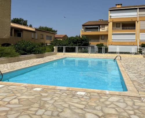 Valras-Plage Apartamento | Agréable appartement avec piscine