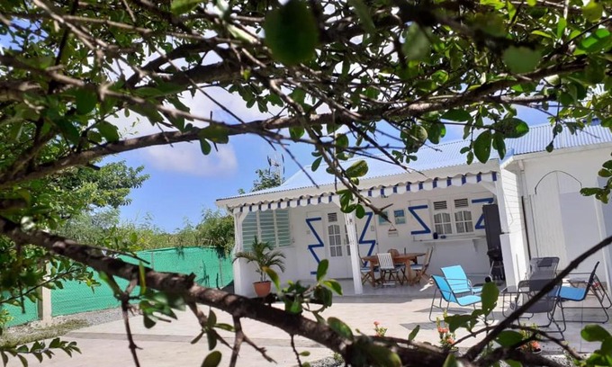 Anse des Rochers Casa | Agréable maison 3 pièces tout confort pour 4 personnes - Vue sur jardin