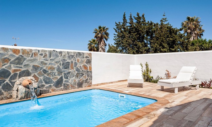 Zahora Casa | Casa de vacaciones con aire acondicionado, patio, piscina, Wi-Fi y césped