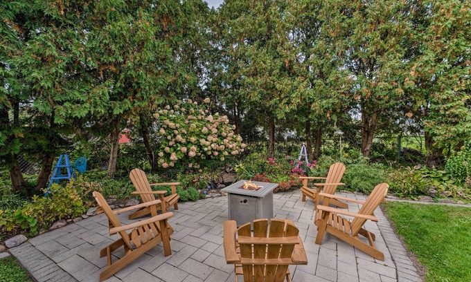 Lake Mills Cabaña | Airy Cottage Close to Rock Lake w/ Fire Pit!
