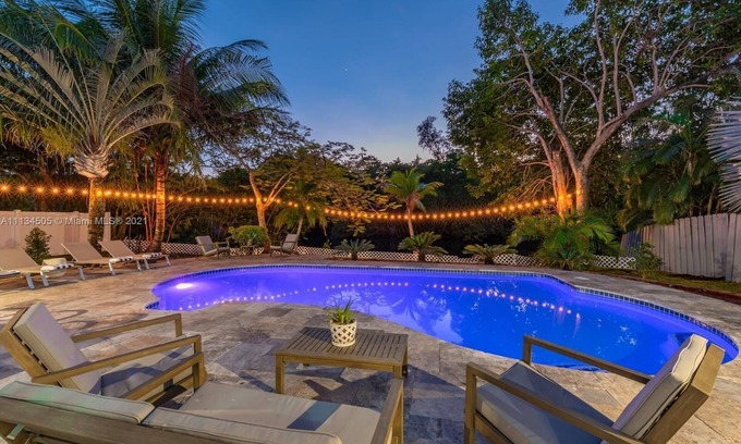 Wilton Manors Casa | Amazing backyard for Family vacation with heated pool.