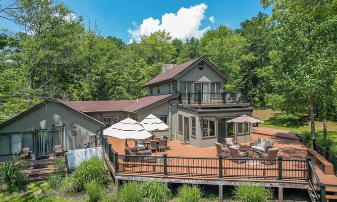 Swanton Casa | Amazing Outdoor Amenities: Tons of Seating, Dock, Hot Tub, Fire Pit + More