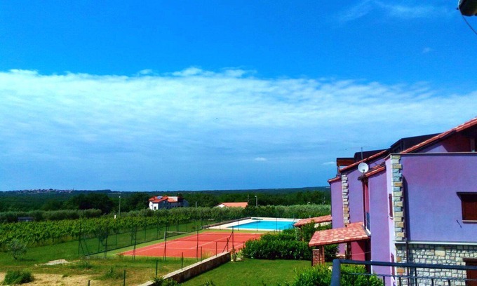 Gedici Apartamento | Increíble vista al mar, residencia con piscina y cancha de tenis. Solo relájate