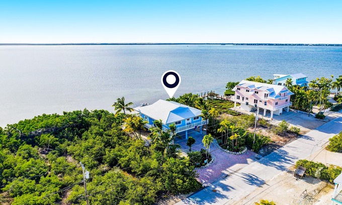 Cutthroat Harbor Estates Casa | Amazing waterfront home with private beach, dock, pool, WiFi & outdoor kitchen