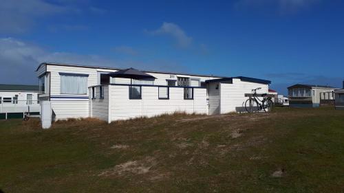 Ballum Casa | AMELAND - Ballum: Stacaravan Chalet (incl. fietsen) bij strand en zee