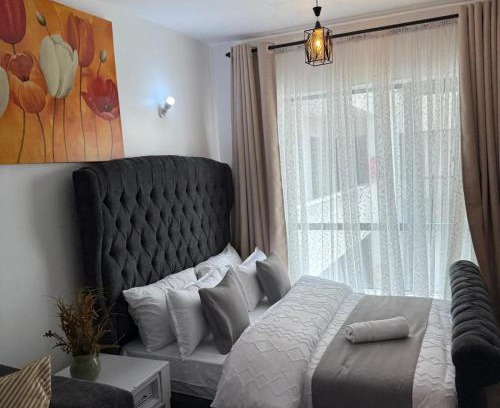 Embakasi Apartamento | amu cozy studio apartment in fedha nairobi