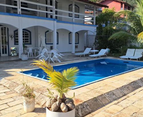 Caieira Casa | ANGRA CASA 6 SUITES PONTA DOS UBÁS - Mar Piscina Deck Churrasqueira Jogos