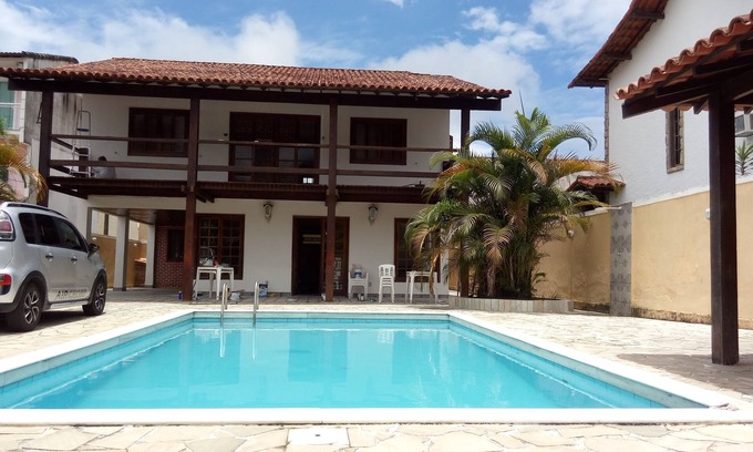 Garatucaia Casa | Casa Angra 4habitacios Condominio Fazenda Garatucaia Piscina y zona de barbacoa.
