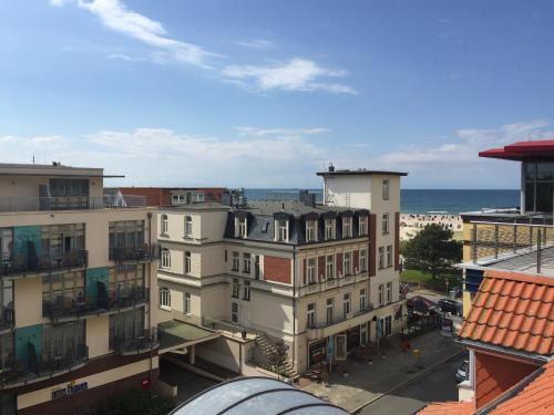 Warnemuende Apartamento | Ankerplatz Warnemünde - Direkte Strandnähe mit Leuchtturmblick