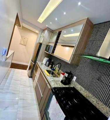 Vila Julia Apartamento | Ap Moderno com vista mar Piscina Ar Condicionado no Guarujá