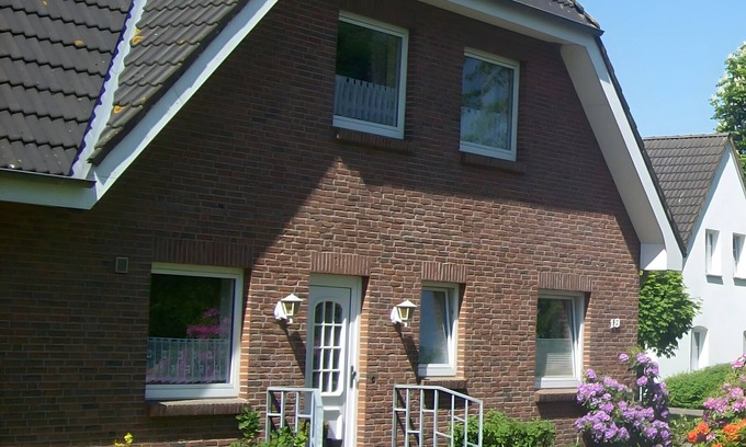 Wesselburener Deichhausen Apartamento | Apartamento 'Ferienwohnung Lüke' con terraza privada, jardín compartido y Wi-Fi