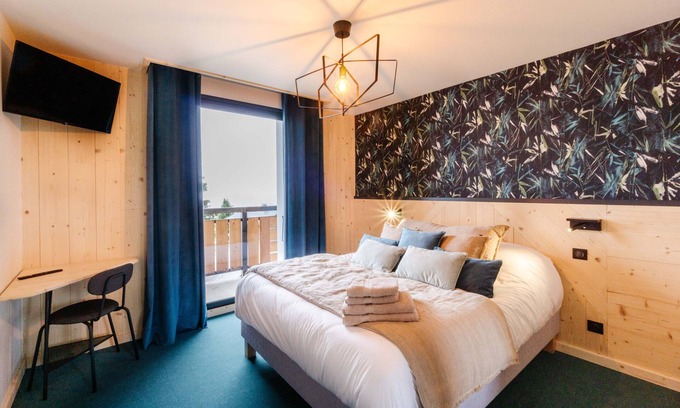 La Toussuire Apartamento | Apartamento "Lodge Six De Savoie" con vistas a las montañas, terraza privada y Wi-Fi