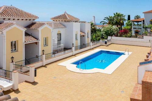Chimenea Apartamento | Apartamento 2 Dormitorios con vistas a la Piscina