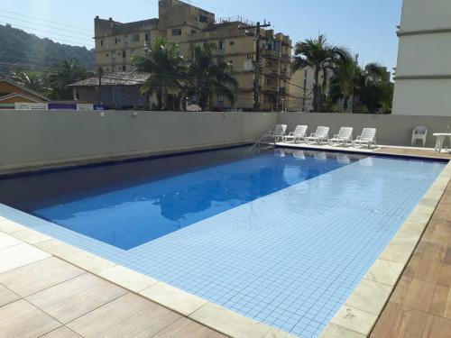 Vila Julia Apartamento | Apartamento 500m Praia da Enseada Guarujá varanda e vaga de garagem