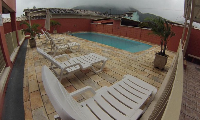 Ipiranga Apartamento | Apartamento charmoso a 50m da praia