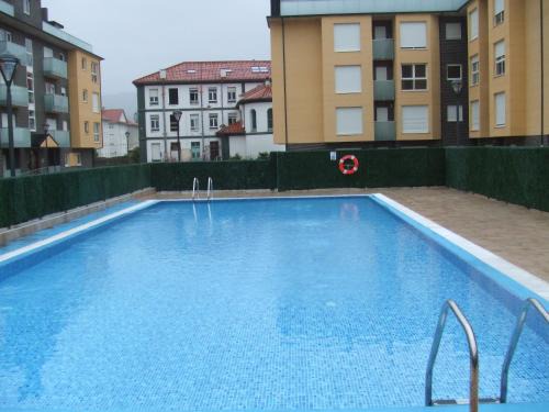 Val de San Vicente Apartamento | APARTAMENTO EN URBANIZACION con PISCINA CENTRO DE UNQUERA-VAL DE SAN VICENTE IDEAL PAREJAS