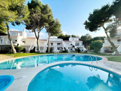 Port d'Addaia Apartamento | Apartamento Lia en Port Addaia, piscina y barbacoa, perfecto para vacaciones