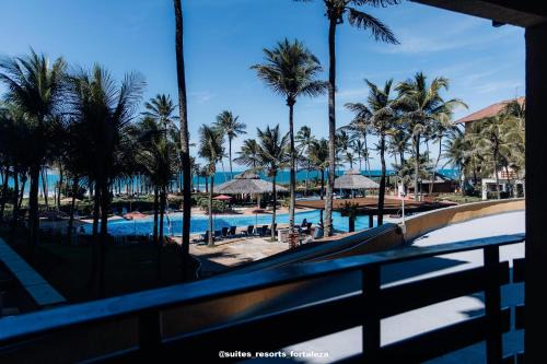 Porto das Dunas Hotel | Apartamento no Suítes Resort - Pé na areia - Ao lado do parque aquático - Administrado por Anfitrião